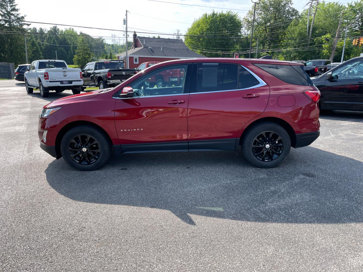 2018 Red /Black Chevrolet Equinox LT AWD (2GNAXSEV2J6) with an 1.5L I4 DOHC 16V TURBO engine, 6-Speed Automatic transmission, located at 11115 Chardon Rd. , Chardon, OH, 44024, (440) 214-9705, 41.580246, -81.241943 - This 2018 Chevrolet Equinox LT AWD with a 1.5L EcoTec Turbocharged engine and 6-speed automatic transmission offers a balanced blend of performance and fuel efficiency with a 30 MPG highway rating. This compact SUV is well-equipped for safety and convenience, featuring blind spot monitoring, rear cr - Photo#12